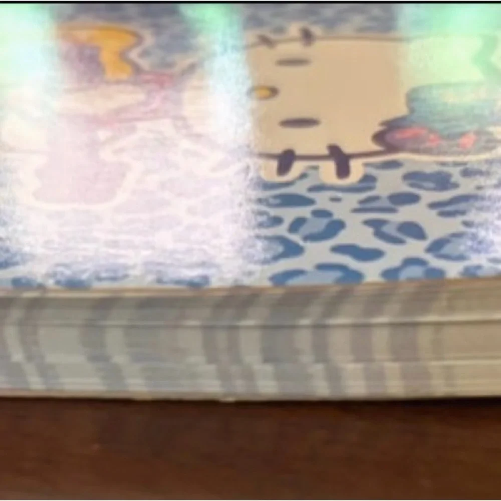 Hello Kitty Blue Leopard Spiral Notepad with Pink Accent